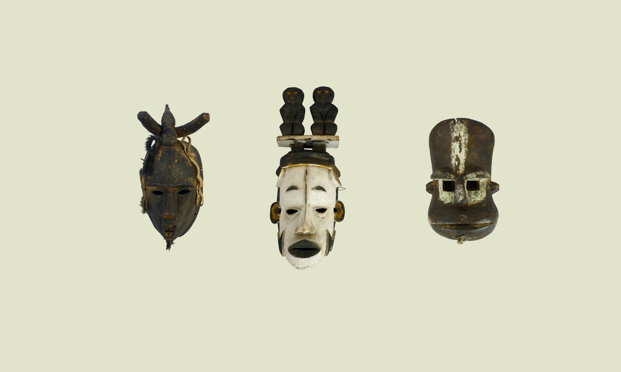 three igbo masks at pitt rivers museum