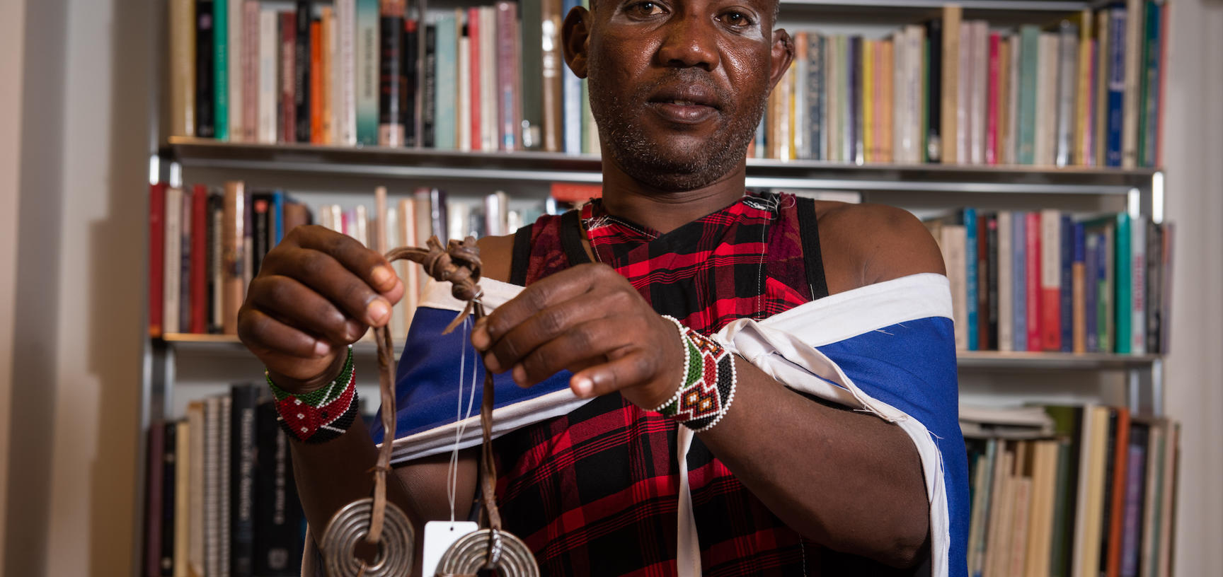 Maasai group member with ornament 