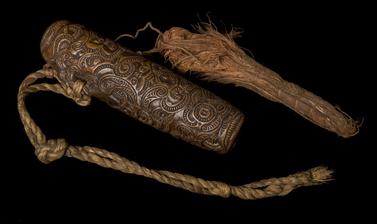 Intricately carved flute.