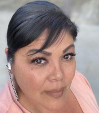 Portrait headshot of Bennae Calac