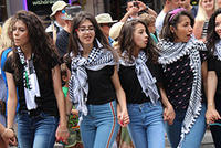 Group of four young women dancing 