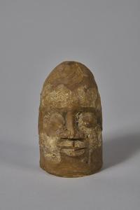 A small wax head-shaped model