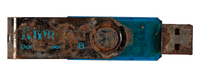 Blue plastic memory stick with rusty metal 